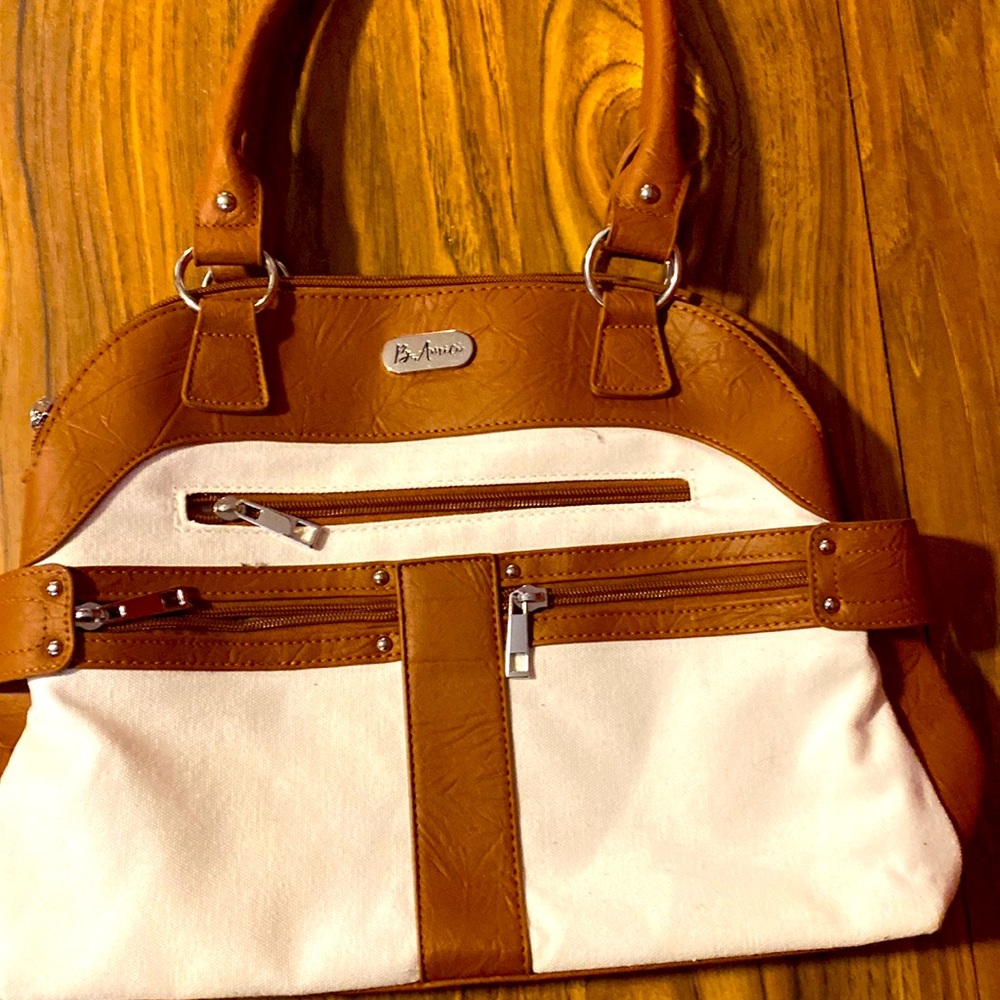 White and brown purse